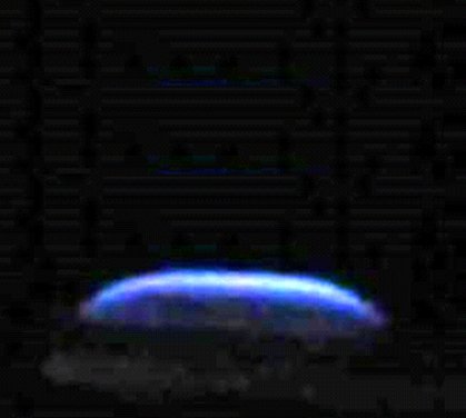 Burning Rate Emulator investigation showing curved ethanol flame in low gravity. (NASA) Burning Rate Emulator investigation showing curved ethanol flame in low gravity. (NASA)