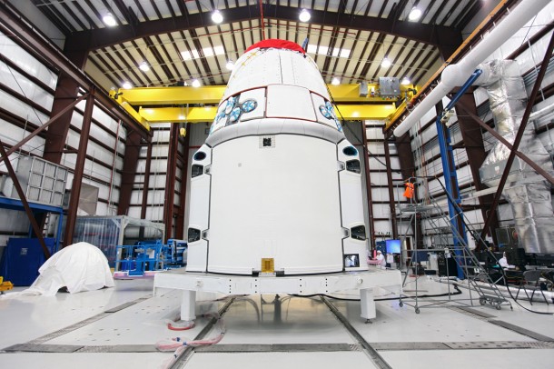 The Dragon spacecraft stands inside a processing hangar at Cape Canaveral Air Force Station where teams had just installed the spacecraft's solar array fairings on Jan. 12, 2013. Image credit: NASA/Kim Shiflett The Dragon spacecraft stands inside a processing hangar at Cape Canaveral Air Force Station where teams had just installed the spacecraft's solar array fairings on Jan. 12, 2013. Image credit: NASA/Kim Shiflett