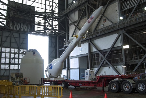 A crane lifts a replica Launch Abort System off its trailer so it can be placed atop a mockup Orion capsule. Photo credit: NASA/Charisse Nahser A crane lifts a replica Launch Abort System off its trailer so it can be placed atop a mockup Orion capsule. Photo credit: NASA/Charisse Nahser