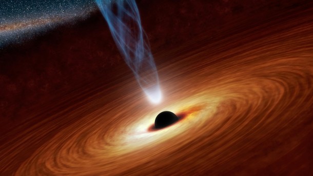 This artist's concept illustrates a supermassive black hole with millions to billions times the mass of our sun. Supermassive black holes are enormously dense objects buried at the hearts of galaxies. Image credit: NASA/JPL-Caltech This artist's concept illustrates a supermassive black hole with millions to billions times the mass of our sun. Supermassive black holes are enormously dense objects buried at the hearts of galaxies. Image credit: NASA/JPL-Caltech