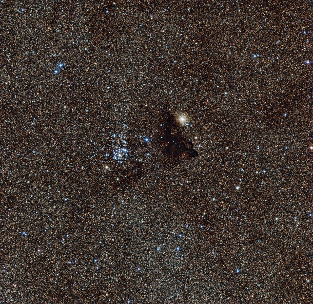 The bright star cluster NGC 6520 and the strangely shaped dark cloud Barnard 86 