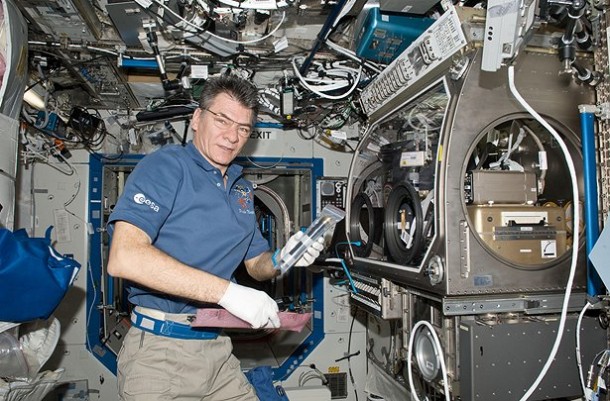 The Microheater Array Boiling Experiment was conducted in the Boiling Experiment Facility (BXF). Here, European Space Agency astronaut Paolo Nespoli, installs the BXF into the Microgravity Science Glovebox aboard the International Space Station. (NASA) The Microheater Array Boiling Experiment was conducted in the Boiling Experiment Facility (BXF). Here, European Space Agency astronaut Paolo Nespoli, installs the BXF into the Microgravity Science Glovebox aboard the International Space Station. (NASA)