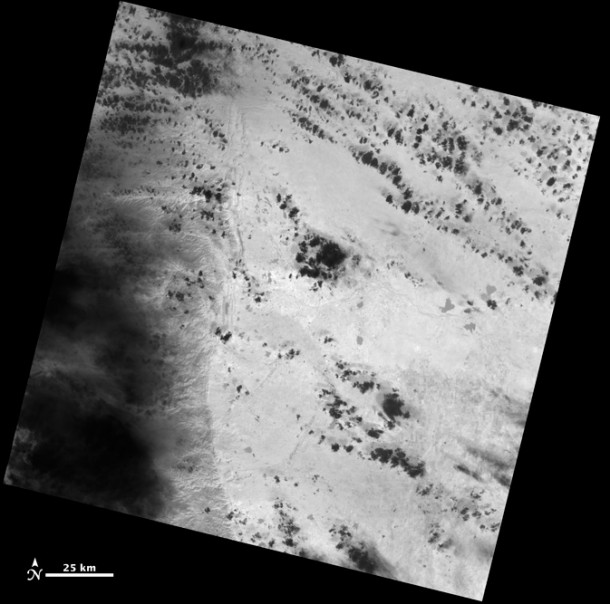 This black-and-white Landsat scene shows the area where the Great Plains meet the Front Range of the Rocky Mountains in Wyoming and Colorado. The image was created using data from the first TIRS thermal infrared band. Warmer surfaces appear light gray to white in the thermal image while cooler areas appear dark gray to black. Clouds in the colder upper atmosphere, for instance, appear black against the lighter background of the warmer ground surface. When the satellite begins normal operations, data products will contain co-registered (simultaneous) data for all of the OLI and TIRS. Note to Landsat data users: This scene is slightly off set from the standard Path 33, Row 32 Landsat scene as LDCM has not yet reached its nominal 438-mile (705-kilometer) operational orbit. Credit: USGS/NASA Earth Observatory This black-and-white Landsat scene shows the area where the Great Plains meet the Front Range of the Rocky Mountains in Wyoming and Colorado. The image was created using data from the first TIRS thermal infrared band. Warmer surfaces appear light gray to white in the thermal image while cooler areas appear dark gray to black. Clouds in the colder upper atmosphere, for instance, appear black against the lighter background of the warmer ground surface. When the satellite begins normal operations, data products will contain co-registered (simultaneous) data for all of the OLI and TIRS. Note to Landsat data users: This scene is slightly off set from the standard Path 33, Row 32 Landsat scene as LDCM has not yet reached its nominal 438-mile (705-kilometer) operational orbit. Credit: USGS/NASA Earth Observatory