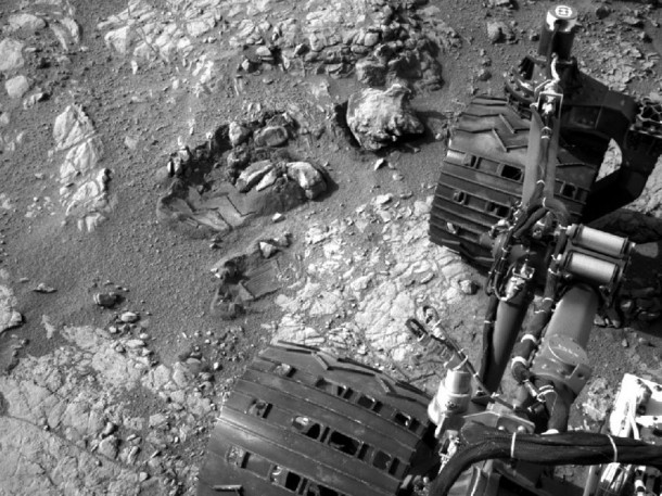 This view of Curiosity's left-front and left-center wheels and of marks made by wheels on the ground in the "Yellowknife Bay" area comes from one of six cameras used on Mars for the first time more than six months after the rover landed. The left Navigation Camera (Navcam) linked to Curiosity's B-side computer took this image during the 223rd Martian day, or sol, of Curiosity's work on Mars (March 22, 2013). The wheels are 20 inches (50 centimeters) in diameter. Image credit: NASA/JPL-Caltech This view of Curiosity's left-front and left-center wheels and of marks made by wheels on the ground in the "Yellowknife Bay" area comes from one of six cameras used on Mars for the first time more than six months after the rover landed. The left Navigation Camera (Navcam) linked to Curiosity's B-side computer took this image during the 223rd Martian day, or sol, of Curiosity's work on Mars (March 22, 2013). The wheels are 20 inches (50 centimeters) in diameter. Image credit: NASA/JPL-Caltech