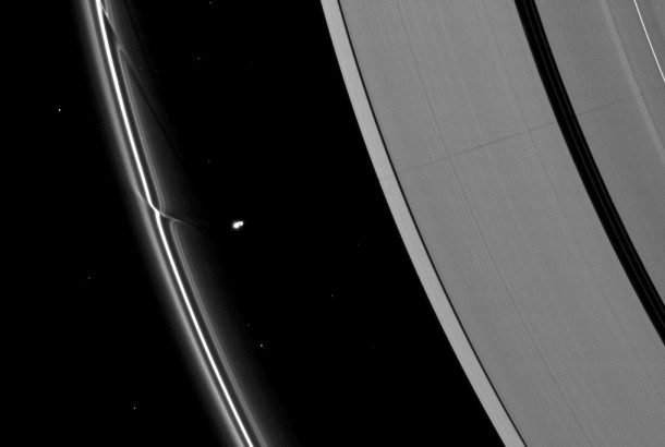 The effects of the small moon Prometheus loom large on two of Saturn's rings in this image taken a short time before Saturn's August 2009 equinox. Image credit: NASA/JPL/Space Science Institute The effects of the small moon Prometheus loom large on two of Saturn's rings in this image taken a short time before Saturn's August 2009 equinox. Image credit: NASA/JPL/Space Science Institute