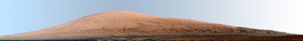 This mosaic of images from the Mast Camera (Mastcam) on NASA's Mars rover Curiosity shows Mount Sharp in a white-balanced color adjustment that makes the sky look overly blue but shows the terrain as if under Earth-like lighting. This mosaic of images from the Mast Camera (Mastcam) on NASA's Mars rover Curiosity shows Mount Sharp in a white-balanced color adjustment that makes the sky look overly blue but shows the terrain as if under Earth-like lighting.