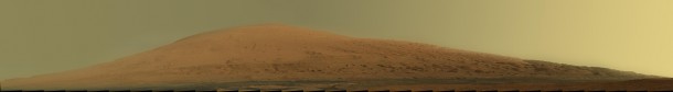 This mosaic of images from the Mast Camera (Mastcam) on NASA's Mars rover Curiosity shows Mount Sharp in raw color as recorded by the camera. Raw color shows the scene's colors as they would look in a typical smart-phone camera photo, before any adjustment. This mosaic of images from the Mast Camera (Mastcam) on NASA's Mars rover Curiosity shows Mount Sharp in raw color as recorded by the camera. Raw color shows the scene's colors as they would look in a typical smart-phone camera photo, before any adjustment.