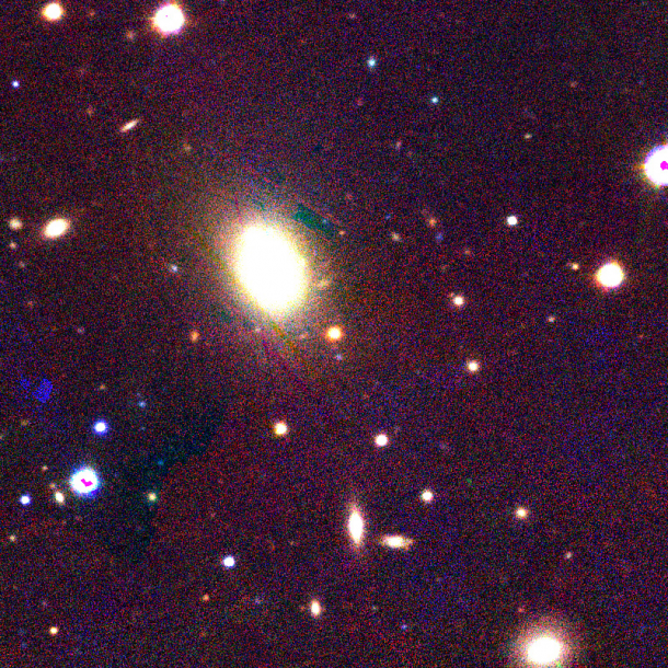 The football-shaped elliptical galaxy near the center of this image hosted a surprising supernova last year. PS1-12sk, the yellow dot at image center, is classified as a very rare Type Ibn supernova - only the sixth such example found out of thousands of supernovae. A Type Ibn supernova is thought to come from the explosion of a young, massive star. However, the site of the explosion shows no signs of recent star formation, and a supernova from a massive star has never before been seen in a galaxy of this type. Credit: CfA / PS1 Science Consortium The football-shaped elliptical galaxy near the center of this image hosted a surprising supernova last year. PS1-12sk, the yellow dot at image center, is classified as a very rare Type Ibn supernova - only the sixth such example found out of thousands of supernovae. A Type Ibn supernova is thought to come from the explosion of a young, massive star. However, the site of the explosion shows no signs of recent star formation, and a supernova from a massive star has never before been seen in a galaxy of this type. Credit: CfA / PS1 Science Consortium