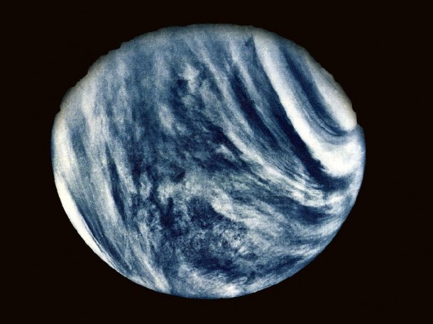 Mariner 10 took this first close-up photo of Venus using an ultraviolet filter in its imaging system on Feb. 5, 1974. The photo is color-enhanced to bring out Venus's cloudy atmosphere, as the human eye would see it. A thick veil of clouds high in carbon dioxide perpetually blankets Venus, and its surface temperature approaches 900 degrees Fahrenheit. Image credit: NASA Mariner 10 took this first close-up photo of Venus using an ultraviolet filter in its imaging system on Feb. 5, 1974. The photo is color-enhanced to bring out Venus's cloudy atmosphere, as the human eye would see it. A thick veil of clouds high in carbon dioxide perpetually blankets Venus, and its surface temperature approaches 900 degrees Fahrenheit. Image credit: NASA