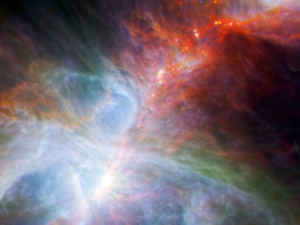 This view of the Orion nebula, taken by the Herschel and Spitzer space telescopes, highlights fledgling stars hidden in the gas and dust clouds. Image credit: NASA/ESA/JPL-Caltech/IRAM This view of the Orion nebula, taken by the Herschel and Spitzer space telescopes, highlights fledgling stars hidden in the gas and dust clouds. Image credit: NASA/ESA/JPL-Caltech/IRAM