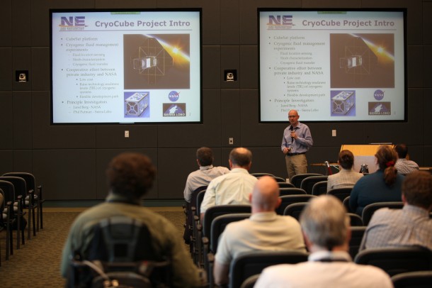 Jared Berg shows his design for a cubesat called CryoCube-1 that would evaluate storage and movement of super-cold chemicals in space. Photo credit: NASA/Dmitri Gerondidakis Jared Berg shows his design for a cubesat called CryoCube-1 that would evaluate storage and movement of super-cold chemicals in space. Photo credit: NASA/Dmitri Gerondidakis