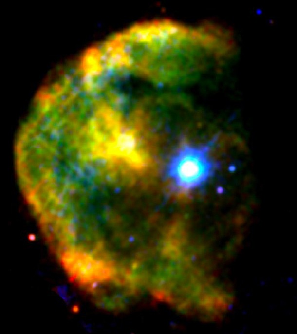 The magnetar 1E 2259+586 shines a brilliant blue-white in this false-color X-ray image of the CTB 109 supernova remnant, which lies about 10,000 light-years away toward the constellation Cassiopeia. CTB 109 is only one of three supernova remnants in our galaxy known to harbor a magnetar. X-rays at low, medium and high energies are respectively shown in red, green, and blue in this image created from observations acquired by the European Space Agency's XMM-Newton satellite in 2002. Credit: ESA/XMM-Newton/M. Sasaki et al. The magnetar 1E 2259+586 shines a brilliant blue-white in this false-color X-ray image of the CTB 109 supernova remnant, which lies about 10,000 light-years away toward the constellation Cassiopeia. CTB 109 is only one of three supernova remnants in our galaxy known to harbor a magnetar. X-rays at low, medium and high energies are respectively shown in red, green, and blue in this image created from observations acquired by the European Space Agency's XMM-Newton satellite in 2002. Credit: ESA/XMM-Newton/M. Sasaki et al.