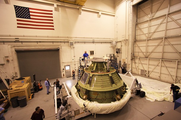 Workers moved the Orion ground test vehicle (GTA) from the Operations and Checkout Building to the Launch Equipment Test Facility on May 13. Lockheed Martin workers uncovered the GTA to prepare it for the second series of pyrotechnic bolt tests at Kennedy Space Center in Florida. Photo credit: Jim Grossman Workers moved the Orion ground test vehicle (GTA) from the Operations and Checkout Building to the Launch Equipment Test Facility on May 13. Lockheed Martin workers uncovered the GTA to prepare it for the second series of pyrotechnic bolt tests at Kennedy Space Center in Florida. Photo credit: Jim Grossman