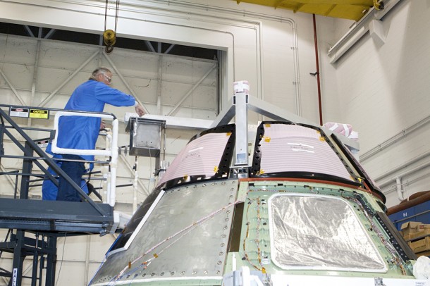 In October 2012, Lockheed Martin workers prepared the Orion ground test vehicle for the first series of pyrotechnic bolt tests inside the Launch Equipment Test Facility at Kennedy Space Center in Florida. Photo Credit: Kim Shiflett In October 2012, Lockheed Martin workers prepared the Orion ground test vehicle for the first series of pyrotechnic bolt tests inside the Launch Equipment Test Facility at Kennedy Space Center in Florida. Photo Credit: Kim Shiflett