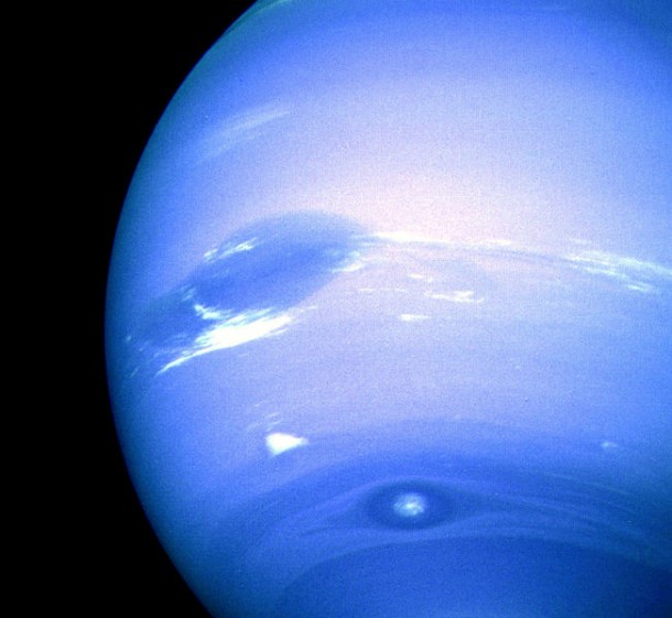 Image from the Voyager II flyby of Neptune in August 1989 (NASA). In the middle is the Great Dark Spot, accompanied by bright, white clouds that undergo rapid changes in appearance. To the south of the Great Dark Spot is the bright feature that Voyager scientists nicknamed "Scooter." Still farther south is the feature called "Dark Spot 2," which has a bright core. As each feature moves eastward at a different velocity, they are rarely aligned this way. Wind velocities near the equator are westward, reaching 1300 km/h, while those at higher latitudes are eastward, peaking at 900 km/h Image from the Voyager II flyby of Neptune in August 1989 (NASA). In the middle is the Great Dark Spot, accompanied by bright, white clouds that undergo rapid changes in appearance. To the south of the Great Dark Spot is the bright feature that Voyager scientists nicknamed "Scooter." Still farther south is the feature called "Dark Spot 2," which has a bright core. As each feature moves eastward at a different velocity, they are rarely aligned this way. Wind velocities near the equator are westward, reaching 1300 km/h, while those at higher latitudes are eastward, peaking at 900 km/h