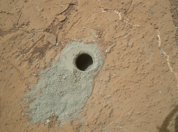 NASA's Mars rover Curiosity drilled into this rock target, "Cumberland," during the 279th Martian day, or sol, of the rover's work on Mars (May 19, 2013) and collected a powdered sample of material from the rock's interior. Analysis of the Cumberland sample using laboratory instruments inside Curiosity will check results from "John Klein," the first rock on Mars from which a sample was ever collected and analyzed. The two rocks have similar appearance and lie about nine feet (2.75 meters) apart. Image Credit: NASA/JPL-Caltech/MSSS NASA's Mars rover Curiosity drilled into this rock target, "Cumberland," during the 279th Martian day, or sol, of the rover's work on Mars (May 19, 2013) and collected a powdered sample of material from the rock's interior. Analysis of the Cumberland sample using laboratory instruments inside Curiosity will check results from "John Klein," the first rock on Mars from which a sample was ever collected and analyzed. The two rocks have similar appearance and lie about nine feet (2.75 meters) apart. Image Credit: NASA/JPL-Caltech/MSSS