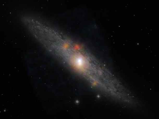 The Sculptor galaxy is seen in a new light, in this composite image from NASA's Nuclear Spectroscopic Telescope Array (NuSTAR) and the European Southern Observatory in Chile. Image credit: NASA/JPL-Caltech/JHU The Sculptor galaxy is seen in a new light, in this composite image from NASA's Nuclear Spectroscopic Telescope Array (NuSTAR) and the European Southern Observatory in Chile. Image credit: NASA/JPL-Caltech/JHU