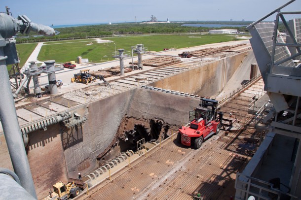 Launch Pad 39B crawler track panels have been removed from the surface and construction workers are repairing the concrete surface and catacomb roof below. Launch Pad 39B is being refurbished to support NASA’s Space Launch System and other launch vehicles. The Ground Systems Development and Operations, or GSDO, Program office at Kennedy is leading the center’s transformation to safely handle a variety of rockets and spacecraft. Photo credit: NASA/Jim Grossman Launch Pad 39B crawler track panels have been removed from the surface and construction workers are repairing the concrete surface and catacomb roof below. Launch Pad 39B is being refurbished to support NASA’s Space Launch System and other launch vehicles. The Ground Systems Development and Operations, or GSDO, Program office at Kennedy is leading the center’s transformation to safely handle a variety of rockets and spacecraft. Photo credit: NASA/Jim Grossman