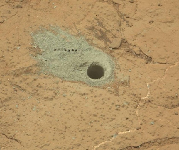 The Chemistry and Camera (ChemCam) instrument on NASA's Mars rover Curiosity was used to check the composition of gray tailings from the hole in rock target "Cumberland" that the rover drilled on May 19, 2013. Image credit: NASA/JPL-Caltech/MSSS The Chemistry and Camera (ChemCam) instrument on NASA's Mars rover Curiosity was used to check the composition of gray tailings from the hole in rock target "Cumberland" that the rover drilled on May 19, 2013. Image credit: NASA/JPL-Caltech/MSSS