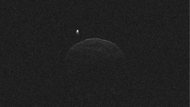 This image of asteroid 1998 QE2 was obtained on June 1, 2013, when the asteroid was about 3.75 million miles (6 million kilometers) from Earth. The small white dot at lower right is the moon, or satellite, orbiting asteroid 1998 QE2. Image credit: NASA/JPL-Caltech/GSSR This image of asteroid 1998 QE2 was obtained on June 1, 2013, when the asteroid was about 3.75 million miles (6 million kilometers) from Earth. The small white dot at lower right is the moon, or satellite, orbiting asteroid 1998 QE2. Image credit: NASA/JPL-Caltech/GSSR