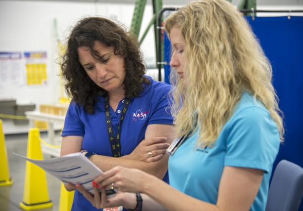 Image Above: NASA astronaut Serena Aunon and Andrea Gilkey, a human factors engineer with The Boeing Company, tag up prior to a fit check of the CST-100 spacecraft. Image Credit: NASA/Robert Markowitz Image Above: NASA astronaut Serena Aunon and Andrea Gilkey, a human factors engineer with The Boeing Company, tag up prior to a fit check of the CST-100 spacecraft. Image Credit: NASA/Robert Markowitz