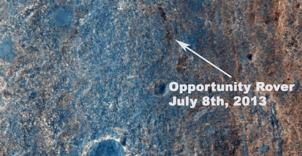 NASA's Mars Exploration Rover Opportunity has been on the western rim of Endeavour Crater in Meridiani Planum for about two years. Until May 2013, it was investigating sedimentary layers that are three to four billion years old on a portion of the rim called "Cape York." This image taken by the High Resolution Imaging Science Experiment (HiRISE) camera on NASA's Mars Reconnaissance Orbiter on July 8, 2013, captures Opportunity traversing south (at the end of the white arrow) to new science targets and a winter haven at "Solander Point," another portion of the Endeavour rim. The relatively level ground between Cape York and Solander Point is called "Botany Bay." The image was taken 10 years after Opportunity was launched from Florida on July 7, 2013, EDT and PDT (July 8, Universal Time). Image credit: NASA/JPL-Caltech/Univ. of Arizona NASA's Mars Exploration Rover Opportunity has been on the western rim of Endeavour Crater in Meridiani Planum for about two years. Until May 2013, it was investigating sedimentary layers that are three to four billion years old on a portion of the rim called "Cape York." This image taken by the High Resolution Imaging Science Experiment (HiRISE) camera on NASA's Mars Reconnaissance Orbiter on July 8, 2013, captures Opportunity traversing south (at the end of the white arrow) to new science targets and a winter haven at "Solander Point," another portion of the Endeavour rim. The relatively level ground between Cape York and Solander Point is called "Botany Bay." The image was taken 10 years after Opportunity was launched from Florida on July 7, 2013, EDT and PDT (July 8, Universal Time). Image credit: NASA/JPL-Caltech/Univ. of Arizona