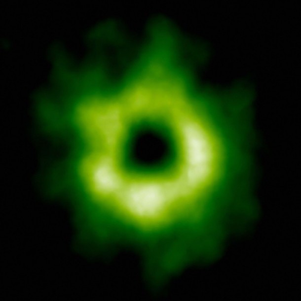 This ALMA image shows the region where carbon monoxide snow has formed around the star. The carbon monoxide is shown here in green, and begins at a distance of more than 30 astronomical units from TW Hydrae. Aside from being necessary for planetary and comet formation, carbon monoxide is needed for the creation of methanol which is a fundamental building block required for life. Credit: ALMA (ESO/NAOJ/NRAO) This ALMA image shows the region where carbon monoxide snow has formed around the star. The carbon monoxide is shown here in green, and begins at a distance of more than 30 astronomical units from TW Hydrae. Aside from being necessary for planetary and comet formation, carbon monoxide is needed for the creation of methanol which is a fundamental building block required for life. Credit: ALMA (ESO/NAOJ/NRAO)