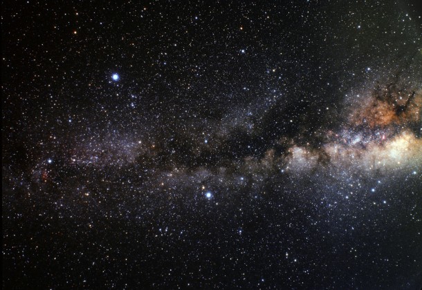 A wide field image of the region of sky in which HD 189733b is located. In this image we can see the asterism of the "Summer Triangle" a giant triangle in the sky composed of the three bright stars Vega (top left), Altair (lower middle) and Deneb (far left). HD 189733b is orbiting a star very close to the centre of the triangle. Credit: A. Fujii A wide field image of the region of sky in which HD 189733b is located. In this image we can see the asterism of the "Summer Triangle" a giant triangle in the sky composed of the three bright stars Vega (top left), Altair (lower middle) and Deneb (far left). HD 189733b is orbiting a star very close to the centre of the triangle. Credit: A. Fujii