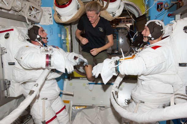 Flight Engineers Chris Cassidy (left) and Luca Parmitano participate in a "dry run" in the International Space Station's Quest airlock in preparation for the first of two spacewalks. Flight Engineer Karen Nyberg assists Cassidy and Parmitano. Image Credit: NASA Flight Engineers Chris Cassidy (left) and Luca Parmitano participate in a "dry run" in the International Space Station's Quest airlock in preparation for the first of two spacewalks. Flight Engineer Karen Nyberg assists Cassidy and Parmitano. Image Credit: NASA