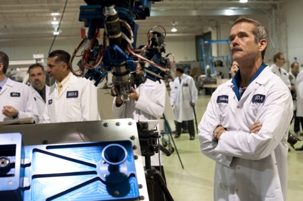 Canadian Astronaut Chris Hadfield looks on at a demonstration of the Next-Generation Canadarm (NGC) Small Canadarm prototype during a visit to the NGC prime contractor, MDA of Brampton, Ontario, in September 2012. (Credit: Canadian Space Agency) Canadian Astronaut Chris Hadfield looks on at a demonstration of the Next-Generation Canadarm (NGC) Small Canadarm prototype during a visit to the NGC prime contractor, MDA of Brampton, Ontario, in September 2012. (Credit: Canadian Space Agency)