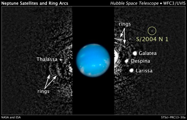This composite Hubble Space Telescope picture shows the location of a newly discovered moon, designated S/2004 N 1, orbiting Neptune. The black and white image was taken in 2009 with Hubble’s Wide Field Camera 3 in visible light. Hubble took the color inset of Neptune on August 2009. Image Credit: NASA, ESA, M. Showalter/SETI Institute This composite Hubble Space Telescope picture shows the location of a newly discovered moon, designated S/2004 N 1, orbiting Neptune. The black and white image was taken in 2009 with Hubble’s Wide Field Camera 3 in visible light. Hubble took the color inset of Neptune on August 2009. Image Credit: NASA, ESA, M. Showalter/SETI Institute