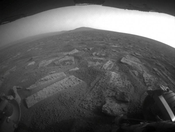 This view shows the terrain that NASA's Mars Exploration Rover Opportunity is crossing in a flat area called "Botany Bay" on the way toward "Solander Point," which is visible on the horizon. Image credit: NASA/JPL-Caltech This view shows the terrain that NASA's Mars Exploration Rover Opportunity is crossing in a flat area called "Botany Bay" on the way toward "Solander Point," which is visible on the horizon. Image credit: NASA/JPL-Caltech