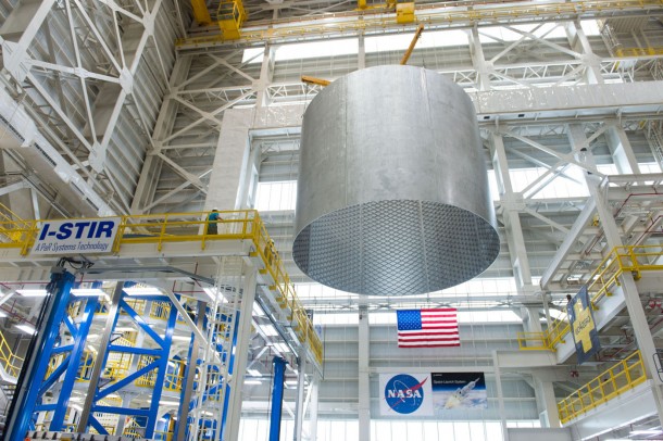 Engineers at NASA's Michoud Assembly Facility transfer a 22-foot-tall barrel section of the SLS core stage from the Vertical Weld Center. Engineers at NASA's Michoud Assembly Facility transfer a 22-foot-tall barrel section of the SLS core stage from the Vertical Weld Center.