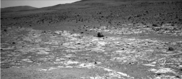 This view from NASA's Mars Exploration Rover Opportunity shows an area where a pale-toned geological unit called the "Burns Foundation," in the foreground, abuts a different geological unit. The darker unit, believed to be older, marks the edge of "Solander Point," a raised segment of the western rim of Endeavour Crater. Image credit: NASA/JPL-Caltech This view from NASA's Mars Exploration Rover Opportunity shows an area where a pale-toned geological unit called the "Burns Foundation," in the foreground, abuts a different geological unit. The darker unit, believed to be older, marks the edge of "Solander Point," a raised segment of the western rim of Endeavour Crater. Image credit: NASA/JPL-Caltech
