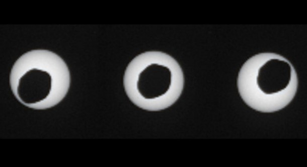 This set of three images shows views three seconds apart as the larger of Mars' two moons, Phobos, passed directly in front of the sun as seen by NASA's Mars rover Curiosity. Curiosity photographed this annular, or ring, eclipse with the telephoto-lens camera of the rover's Mast Camera pair (right Mastcam) on Aug. 17, 2013, the 369th Martian day, or sol, of Curiosity's work on Mars. Image credit: NASA/JPL-Caltech/Malin Space Science Systems/Texas A&M Univ. This set of three images shows views three seconds apart as the larger of Mars' two moons, Phobos, passed directly in front of the sun as seen by NASA's Mars rover Curiosity. Curiosity photographed this annular, or ring, eclipse with the telephoto-lens camera of the rover's Mast Camera pair (right Mastcam) on Aug. 17, 2013, the 369th Martian day, or sol, of Curiosity's work on Mars. Image credit: NASA/JPL-Caltech/Malin Space Science Systems/Texas A&M Univ.