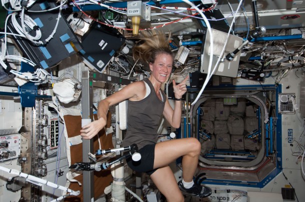 Flight Engineer Karen Nyberg exercising on the Cycle Ergometer with Vibration Isolation System in the Destiny laboratory of the International Space Station. Image Credit: NASA Flight Engineer Karen Nyberg exercising on the Cycle Ergometer with Vibration Isolation System in the Destiny laboratory of the International Space Station. Image Credit: NASA