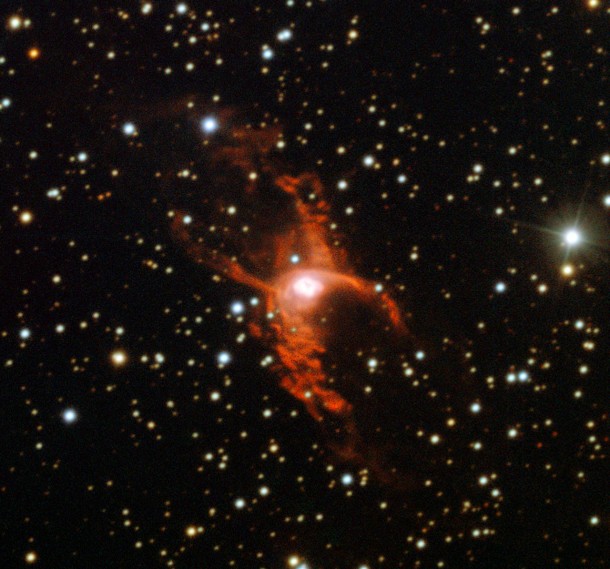 This image shows an example of a bipolar planetary nebula known as NGC 6537 taken with the New Technology Telescope at ESO’s La Silla Observatory. The shape, reminiscent of a butterfly or an hourglass, was formed as a Sun-like star approached the end of its life and puffed its outer layers into the surrounding space. For bipolar nebulae, this material is funnelled towards the poles of the ageing star, creating the distinctive double-lobed structure. Credit: ESO This image shows an example of a bipolar planetary nebula known as NGC 6537 taken with the New Technology Telescope at ESO’s La Silla Observatory. The shape, reminiscent of a butterfly or an hourglass, was formed as a Sun-like star approached the end of its life and puffed its outer layers into the surrounding space. For bipolar nebulae, this material is funnelled towards the poles of the ageing star, creating the distinctive double-lobed structure. Credit: ESO