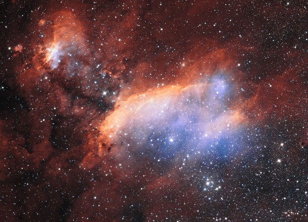 The glowing jumble of gas clouds visible in new image make up a huge stellar nursery nicknamed the Prawn Nebula. Taken using the VLT Survey Telescope at ESO’s Paranal Observatory in Chile, this may well be the sharpest picture ever taken of this object. It shows clumps of hot new-born stars nestled in among the clouds that make up the nebula. This image also contains information from images of this object taken by Martin Pugh. Credit: ESO. Acknowledgement: Martin Pugh The glowing jumble of gas clouds visible in new image make up a huge stellar nursery nicknamed the Prawn Nebula. Taken using the VLT Survey Telescope at ESO’s Paranal Observatory in Chile, this may well be the sharpest picture ever taken of this object. It shows clumps of hot new-born stars nestled in among the clouds that make up the nebula. This image also contains information from images of this object taken by Martin Pugh. Credit: ESO. Acknowledgement: Martin Pugh