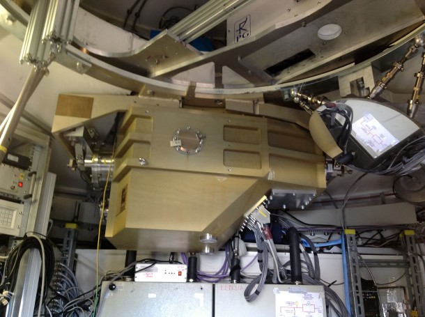 The ArTeMiS cryostat installed in the APEX telescope on the Chajnantor Plateau in northern Chile. ArTeMiS is a new wide-field submillimetre-wavelength camera that will be a major addition to APEX’s suite of instruments and further increase the depth and detail that can be observed. The new generation detector array of ArTeMIS acts more like a CCD camera than the previous generation of detectors. This will let wide-field maps of the sky be made faster and with many more pixels. Credit: ArTeMiS team/ESO The ArTeMiS cryostat installed in the APEX telescope on the Chajnantor Plateau in northern Chile. ArTeMiS is a new wide-field submillimetre-wavelength camera that will be a major addition to APEX’s suite of instruments and further increase the depth and detail that can be observed. The new generation detector array of ArTeMIS acts more like a CCD camera than the previous generation of detectors. This will let wide-field maps of the sky be made faster and with many more pixels. Credit: ArTeMiS team/ESO