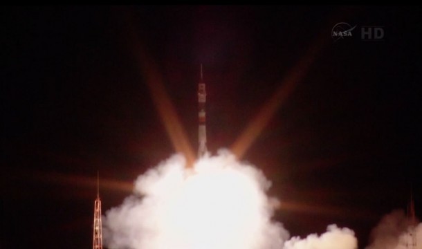 Soyuz Commander Oleg Kotov and Flight Engineers Mike Hopkins and Sergey Ryazanskiy launched aboard a Soyuz TMA-10M spacecraft at 4:58 p.m. EDT Wednesday. Image Credit: NASA TV Soyuz Commander Oleg Kotov and Flight Engineers Mike Hopkins and Sergey Ryazanskiy launched aboard a Soyuz TMA-10M spacecraft at 4:58 p.m. EDT Wednesday. Image Credit: NASA TV
