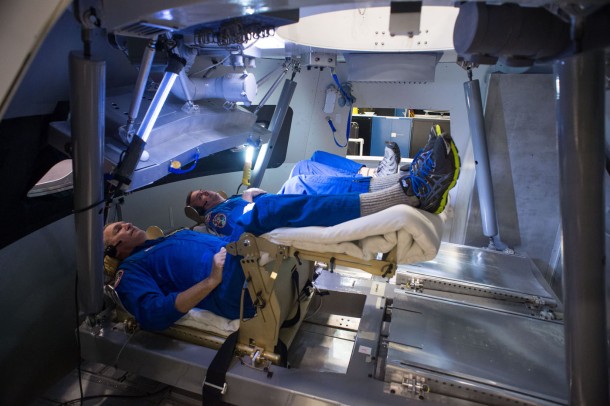 Astronauts Rick Linnehan and Mike Foreman try out a prototype display and control system inside an Orion spacecraft mockup at Johnson Space Center during the first ascent and abort simulations for the program. Image Credit: NASA Astronauts Rick Linnehan and Mike Foreman try out a prototype display and control system inside an Orion spacecraft mockup at Johnson Space Center during the first ascent and abort simulations for the program. Image Credit: NASA