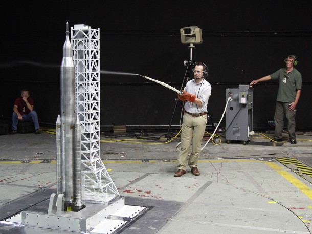 During the liftoff transition testing of a nearly six-foot model of the Space Launch System, engineers used a technique for studying airflow streamlines called smoke flow visualization, giving them insight into the data retrieved. Image Credit: NASA/LaRC During the liftoff transition testing of a nearly six-foot model of the Space Launch System, engineers used a technique for studying airflow streamlines called smoke flow visualization, giving them insight into the data retrieved. Image Credit: NASA/LaRC