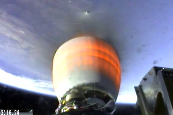 Merlin Vacuum engine on the second stage ignites 7 seconds after stage separation. Copyright SpaceX 2013 Merlin Vacuum engine on the second stage ignites 7 seconds after stage separation. Copyright SpaceX 2013