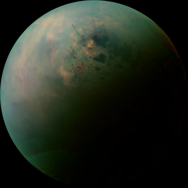 This false-color mosaic, made from infrared data collected by NASA's Cassini spacecraft, reveals the differences in the composition of surface materials around hydrocarbon lakes at Titan, Saturn's largest moon. Image credit: NASA/JPL-Caltech/University of Arizona/University of Idaho This false-color mosaic, made from infrared data collected by NASA's Cassini spacecraft, reveals the differences in the composition of surface materials around hydrocarbon lakes at Titan, Saturn's largest moon. Image credit: NASA/JPL-Caltech/University of Arizona/University of Idaho