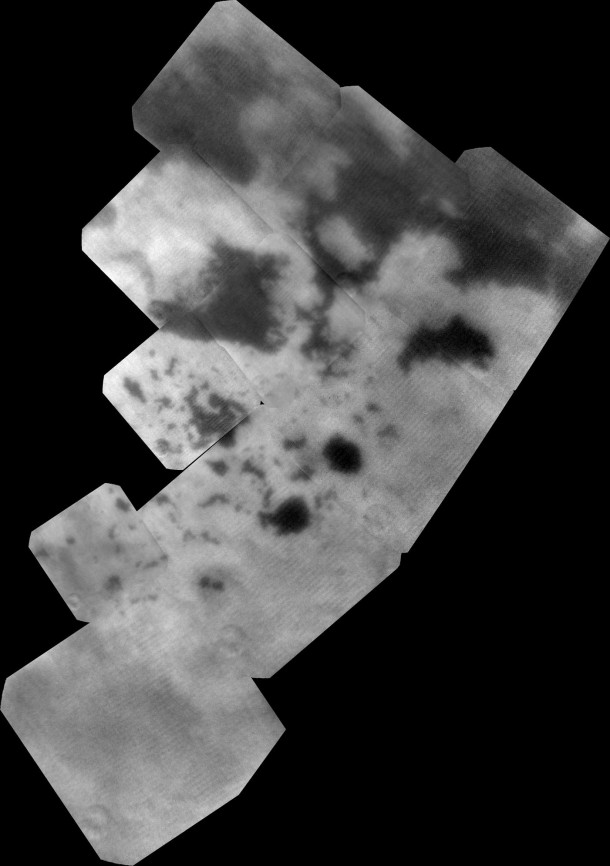 The vast hydrocarbon seas and lakes (dark shapes) near the north pole of Saturn's moon Titan sprawl out beneath the watchful eye of NASA's Cassini spacecraft. Scientists are studying images like these for clues about how Titan's hydrocarbon lakes formed. Titan is the only world other than Earth that is known to have stable bodies of liquid on its surface. Image credit: NASA/JPL-Caltech/SSI/JHUAPL/Univ. of Arizona The vast hydrocarbon seas and lakes (dark shapes) near the north pole of Saturn's moon Titan sprawl out beneath the watchful eye of NASA's Cassini spacecraft. Scientists are studying images like these for clues about how Titan's hydrocarbon lakes formed. Titan is the only world other than Earth that is known to have stable bodies of liquid on its surface. Image credit: NASA/JPL-Caltech/SSI/JHUAPL/Univ. of Arizona