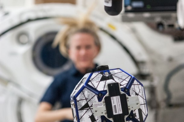 A close-up view of a bowling-ball-sized free-flying satellite known as Synchronized Position Hold, Engage, Reorient, Experimental Satellites, or SPHERES is pictured during a session in the International Space Station's Kibo laboratory. Image Credit: NASA A close-up view of a bowling-ball-sized free-flying satellite known as Synchronized Position Hold, Engage, Reorient, Experimental Satellites, or SPHERES is pictured during a session in the International Space Station's Kibo laboratory. Image Credit: NASA