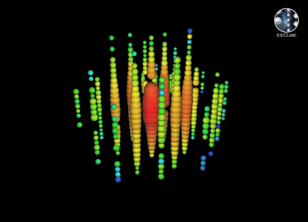 Graphic presentation of the reaction of an extremely high-energy neutrino in the IceCube Detector. The size of the colored cone indicates how much light the sensor has registered, the rainbow colors indicate the time (earlier arrival: red, later arrival: blue). ©: IceCube/NSF Graphic presentation of the reaction of an extremely high-energy neutrino in the IceCube Detector. The size of the colored cone indicates how much light the sensor has registered, the rainbow colors indicate the time (earlier arrival: red, later arrival: blue). ©: IceCube/NSF