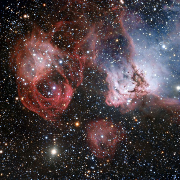 The Large Magellanic Cloud is one of the closest galaxies to our own. Astronomers have now used the power of the ESO’s Very Large Telescope to explore NGC 2035, one of its lesser known regions, in great detail. This new image shows clouds of gas and dust where hot new stars are being born and are sculpting their surroundings into odd shapes. But the image also shows the effects of stellar death — filaments created by a supernova explosion (left). Credit: ESO The Large Magellanic Cloud is one of the closest galaxies to our own. Astronomers have now used the power of the ESO’s Very Large Telescope to explore NGC 2035, one of its lesser known regions, in great detail. This new image shows clouds of gas and dust where hot new stars are being born and are sculpting their surroundings into odd shapes. But the image also shows the effects of stellar death — filaments created by a supernova explosion (left). Credit: ESO