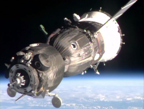 The Soyuz TMA-11 spacecraft with Earth in the background is just moments away from docking to the Rassvet module. Image Credit: NASA TV The Soyuz TMA-11 spacecraft with Earth in the background is just moments away from docking to the Rassvet module. Image Credit: NASA TV