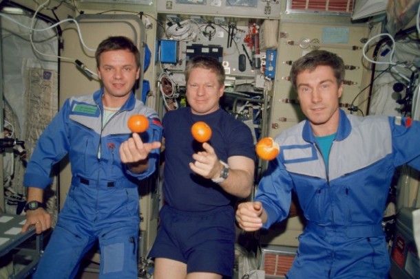 The Expedition One crew members are about to eat fresh fruit onboard the Zvezda Service Module of the Earth-orbiting International Space Station. Image Credit: NASA The Expedition One crew members are about to eat fresh fruit onboard the Zvezda Service Module of the Earth-orbiting International Space Station. Image Credit: NASA